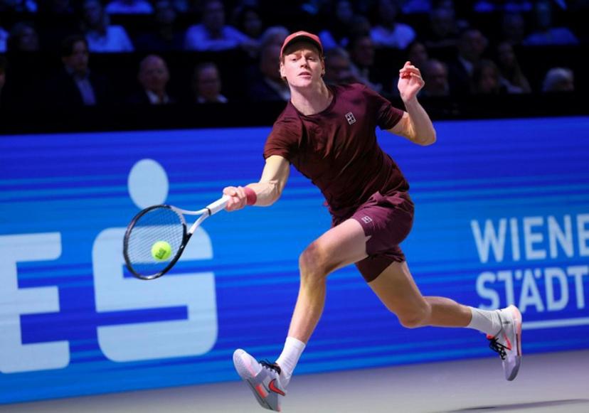 Italy's Jannik Sinner returns the ball to Germany's Alexander Zverev (not in picture) during the men's final singles match at the ATP Vienna Open tennis tournament in Vienna, Austria, on October 26, 2025.  TOBIAS STEINMAURER / APA / AFP
