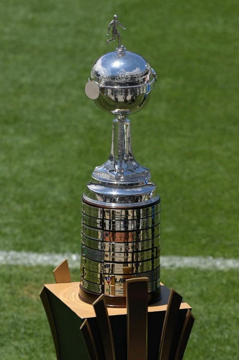 The Copa Libertadores trophy is on display at Mas Monumental stadium in Buenos Aires, on November 29, 2024, on the eve of the Copa Libertadores final football match between Brazil's Atletico Mineiro and Brazil's Botafogo.  JUAN MABROMATA / AFP