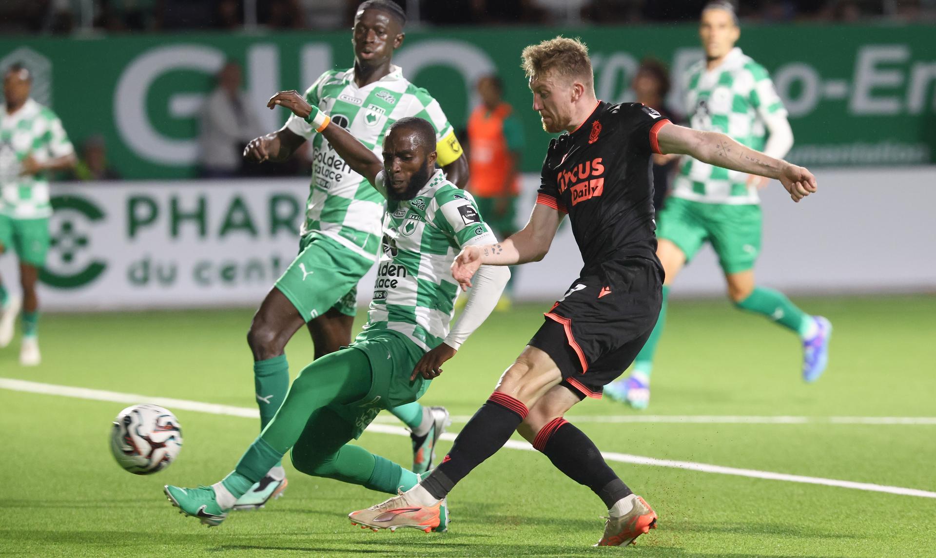 RAAL's Sekou Sidibe and Standard's Tobias Mohr fight for the ball during a soccer match between RAAL La Louviere and Standard de Liege, Saturday 26 July 2025 in La Louviere, on day 1 of the 2025-2026 'Jupiler Pro League' first division of the Belgian championship. BELGA PHOTO VIRGINIE LEFOUR