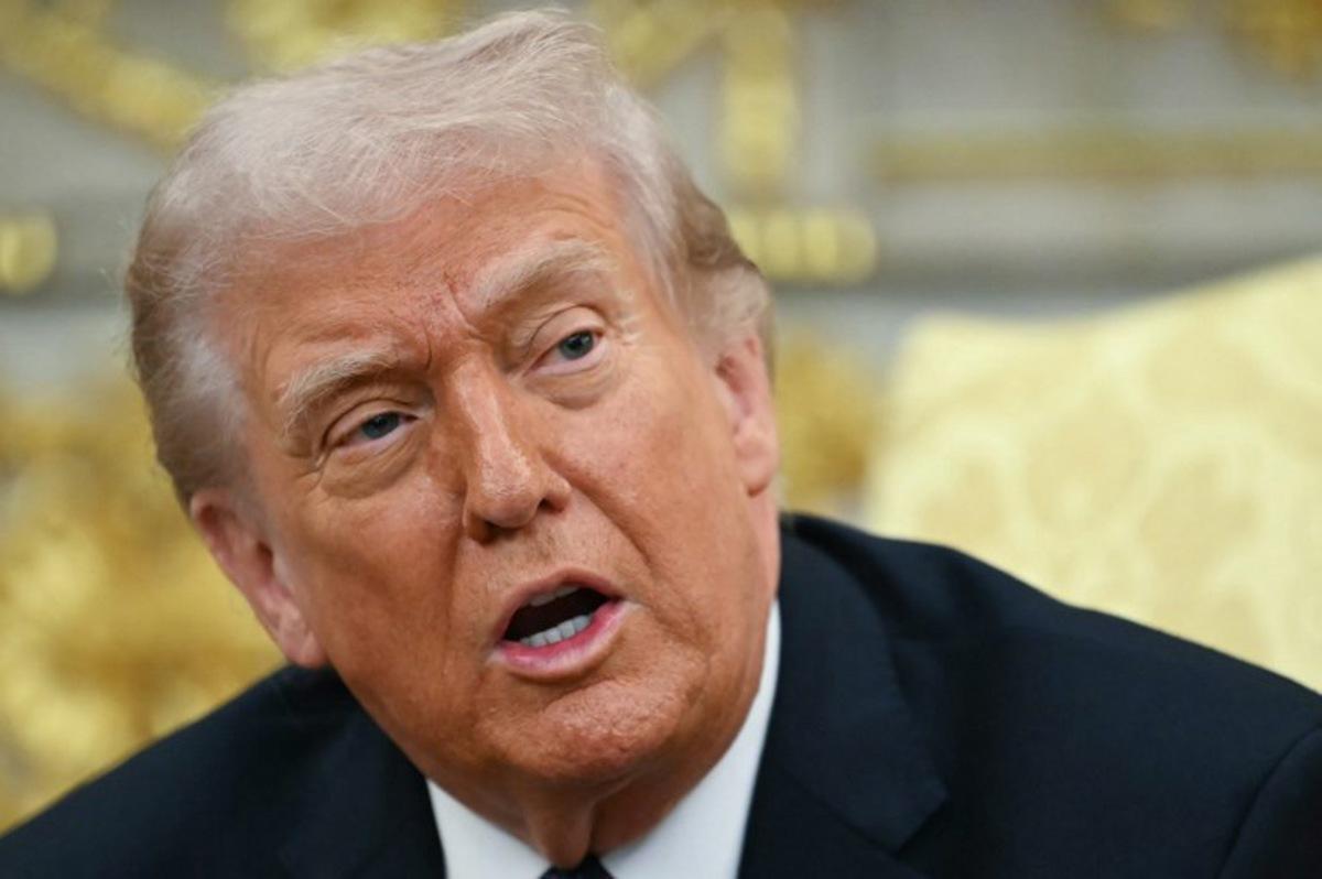 US President Donald Trump speaks during a meeting with German Chancellor Friedrich Merz in the Oval Office of the White House in Washington, DC on March 3, 2026.  Chancellor Merz is the first European leader to visit President Trump since the United States and Israel launched their war against Iran. ANDREW CABALLERO-REYNOLDS / AFP