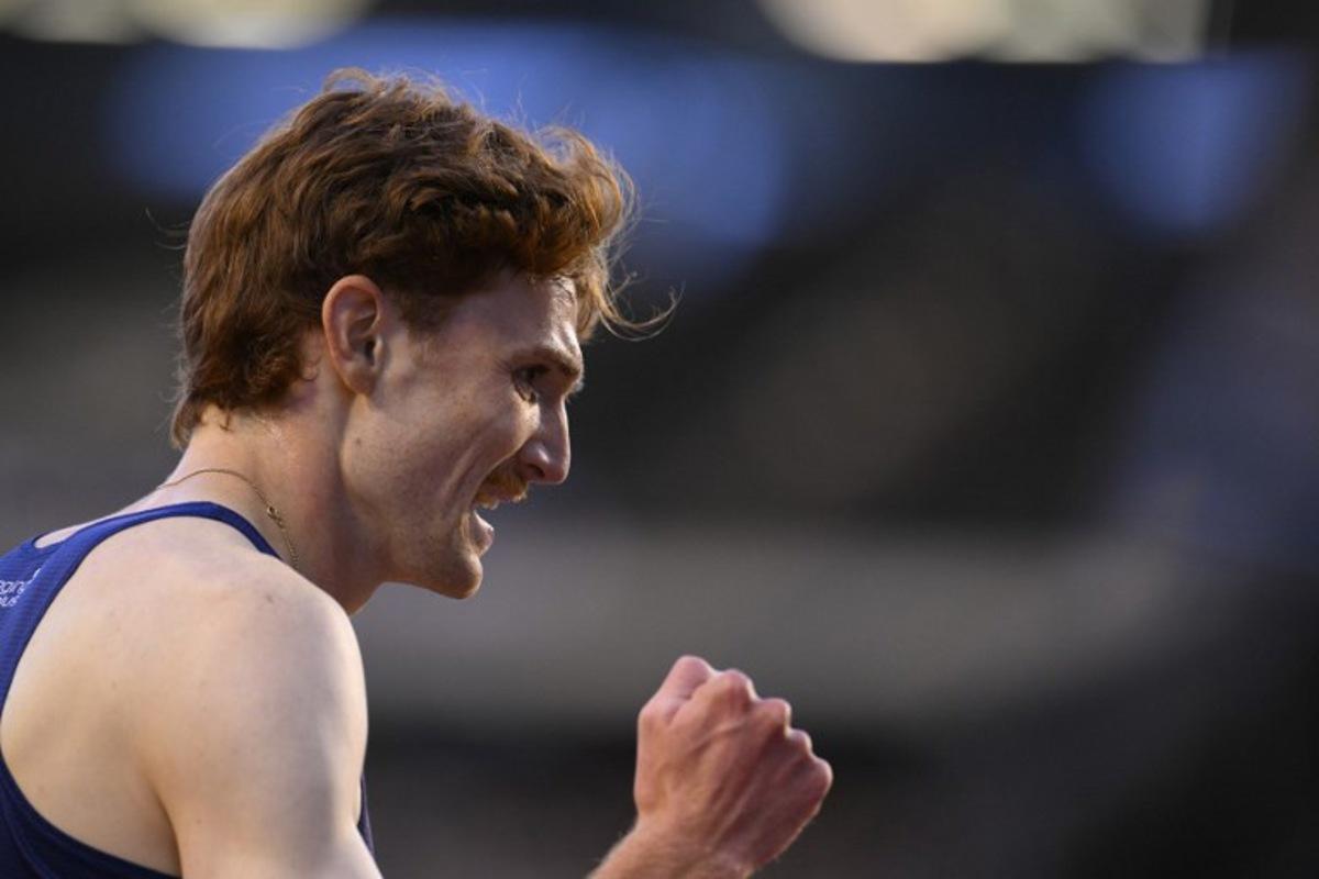 Luxembourg's Ruben Querinjean celebrates after winning the Men's 3000m Steeplechase event of the Diamond League athletics meeting at the King Baudouin Stadium in Brussels on August 22, 2025.  JOHN THYS / AFP