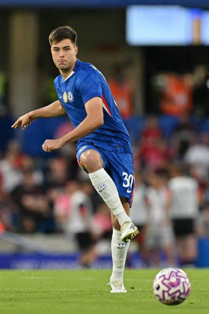Chelsea's Argentinian defender #30 Aaron Anselmino passes the ball during the pre-season friendly football match between Chelsea and Bayer Leverkusen at Stamford Bridge in London on August 8, 2025.   Glyn KIRK / AFP