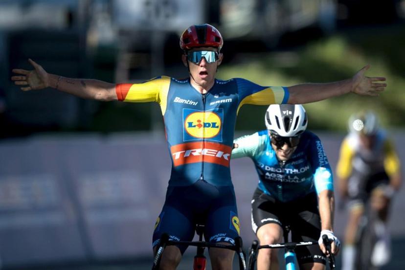 Team Lidl-Trek's Belgian rider Thibau Nys (L) celebrates as he crosses the finish line to win ahead of second placed team Decathlon AG2R La Mondiale's Italian Andrea Vendrame, during the second stage of the Tour of Romandy UCI cycling World tour 171 km from Fribourg to Salvan / Les Marecottes on April 25, 2024.  Fabrice COFFRINI / AFP