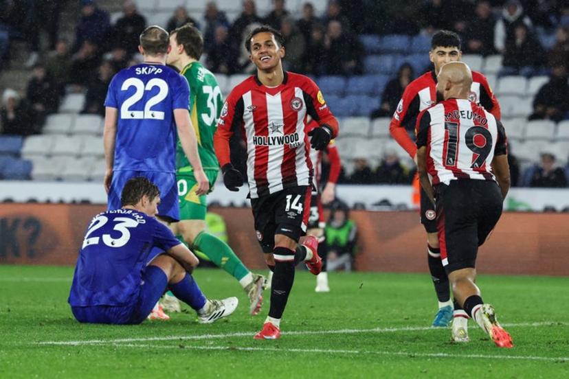 Brentford's Portuguese midfielder #14 Fabio Carvalho (C) celebrates after scoring his team fourth goal during the English Premier League football match between Leicester City and Brentford at King Power Stadium in Leicester, central England on February 21, 2025.  Darren Staples / AFP