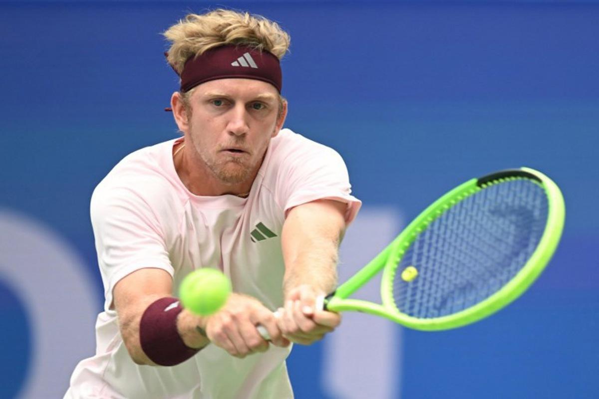 Spain's Alejandro Davidovich Fokia hits a return to France's Alexandre Muller during their men's singles quarter-final match at the Chengdu Open tennis tournament in Chengdu, in China's southwest Sichuan province on September 27, 2026.  STR / AFP