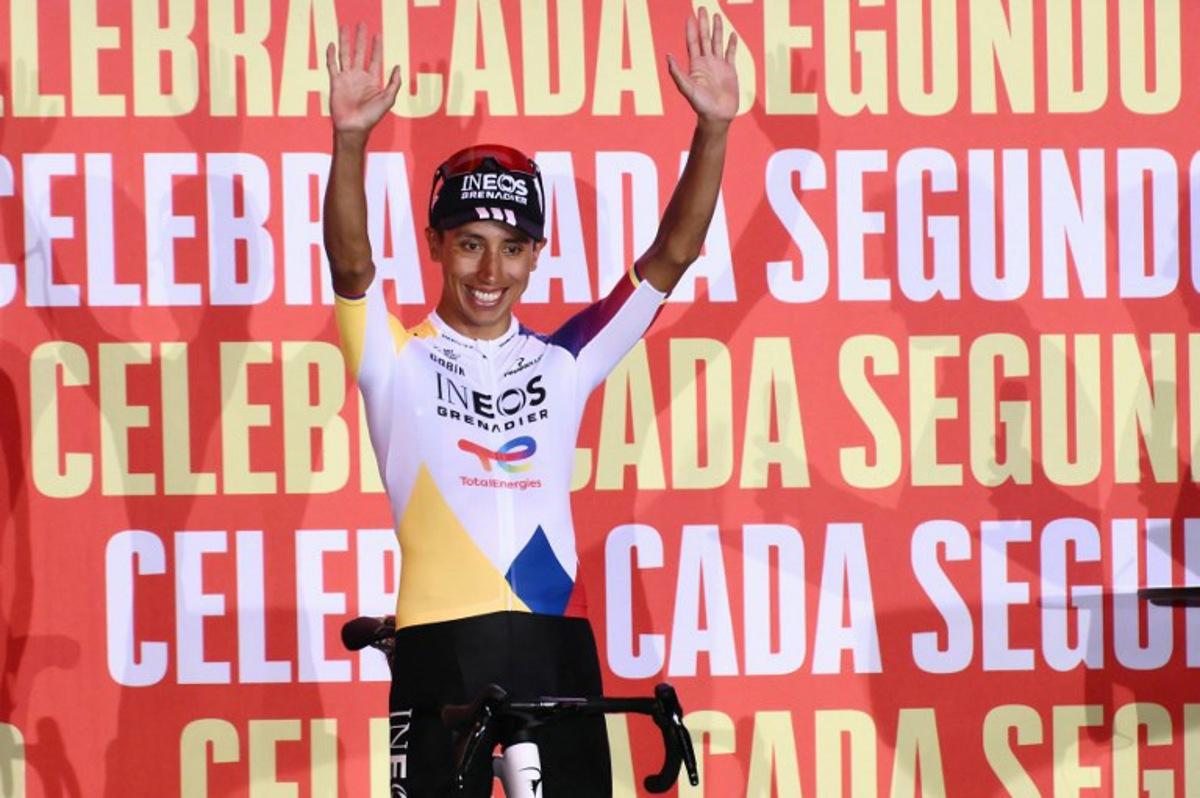Team Ineos' Colombian rider Egan Bernal waves during the official teams presentation of the 80th edition of 'La Vuelta' cycling tour of Spain, in Torino, Italy on August 21, 2025.  Marco BERTORELLO / AFP