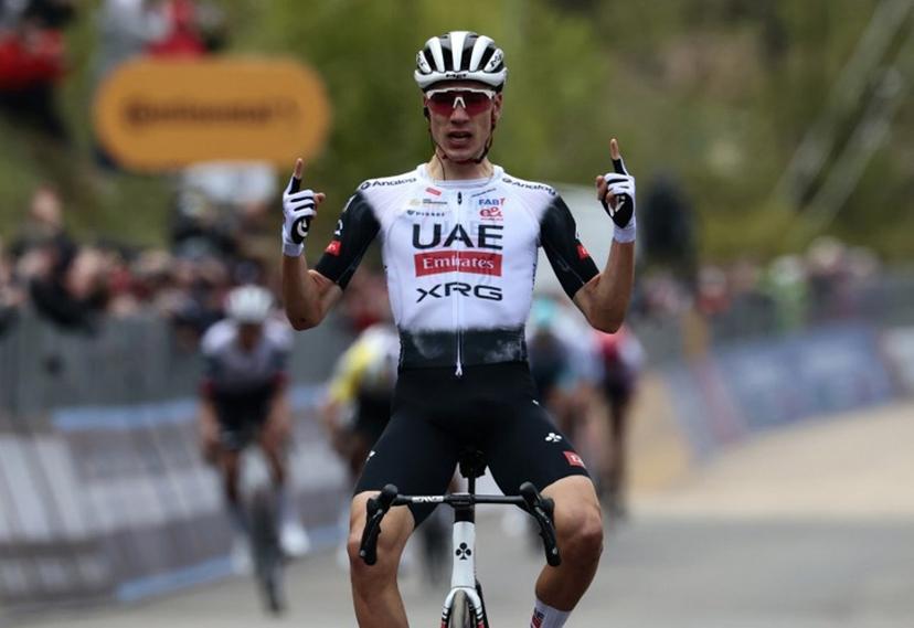 UAE Team Emirates XRG's Spanish rider Juan Ayuso celebrates after victory as he crosses the finish of the 7th stage of the 108th Giro d'Italia cycling race 168kms from Castel di Sangro to Tagliacozzo on May 16, 2025.  Luca Bettini / AFP
