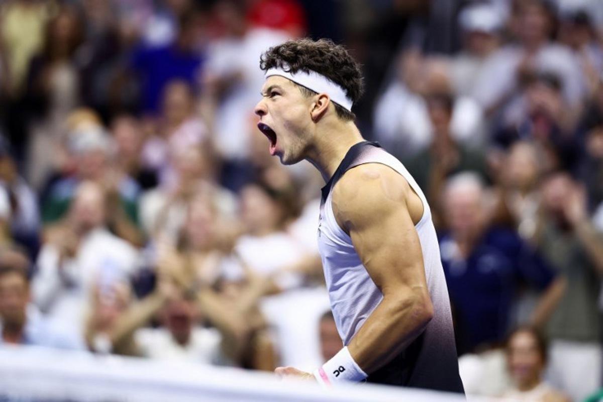 USA's Ben Shelton celebrates after victory during the men's singles round of 16 tennis match against Greece's Stefanos Tsitsipas on day eight of the US Open tennis tournament at the USTA Billie Jean King National Tennis Center in New York City on September 6, 2026.  CHARLY TRIBALLEAU / AFP