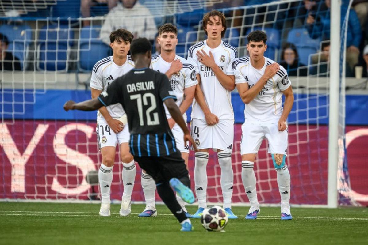 Club Brugge's Belgian midfielder #72 Jessi Da Silva takes a free kick during the UEFA Youth League final football match between Club Brugge and Real Madrid at Stade de la Tuiliere in Lausanne, on April 20, 2026.  Fabrice COFFRINI / AFP
