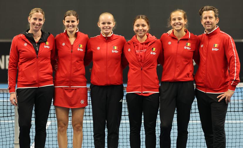 Belgian Magali Kempen, Belgian Greet Minnen, Belgian Jeline Vandromme, Belgian Sofia Costoulas, Belgian Hanne Vandewinkel and Belgian team captain Wim Fissette pose for the photographer at the medal ceremony after the Promotion Play-offs between Belgium and France in the Europe/Africa Group I of the Billie Jean King Cup tennis, on Friday 11 April 2025 in Vilnius, Lithuania. PHOTO VIRGINIE LEFOUR