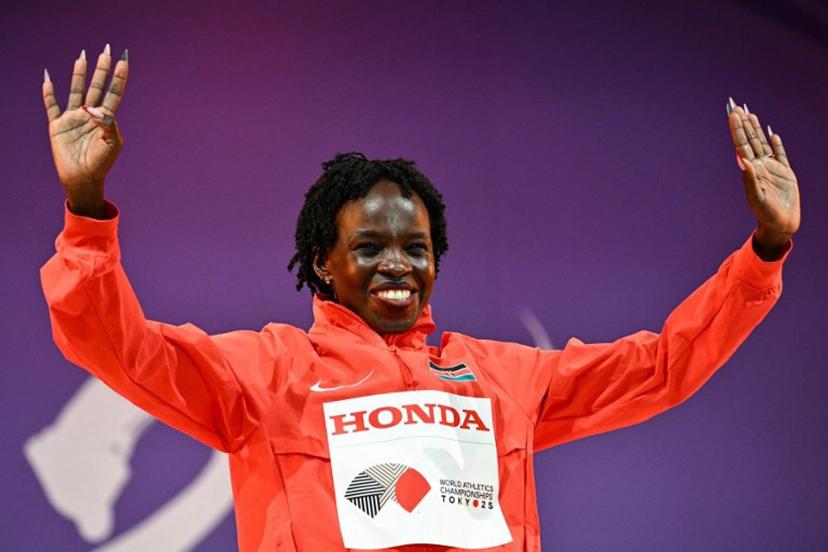Gold medalist Kenya's Peres Jepchirchir celebrates on the podium for the women's marathon during the World Athletics Championships in Tokyo on September 14, 2025.  Philip FONG / AFP