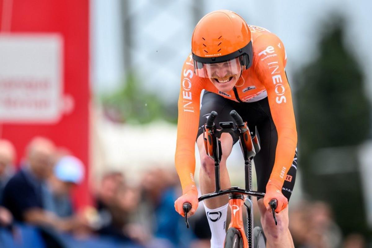 INEOS Grenadiers' French rider Dorian Godon competes in the prologue of the Tour of Romandie UCI cycling World tour, a 3.2 km time trial from Villars-sur-Glane to Villars-sur-Glane on April 28, 2026.  Fabrice COFFRINI / AFP