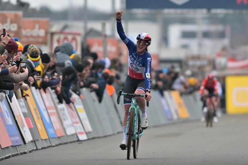 French Amandine Fouquenet celebrates as she crosses the finish line to win the women elite race at the cyclocross cycling event in Heusden-Zolder, stage 5/8 in the Superprestige competition, Tuesday 23 December 2025. BELGA PHOTO DAVID PINTENS