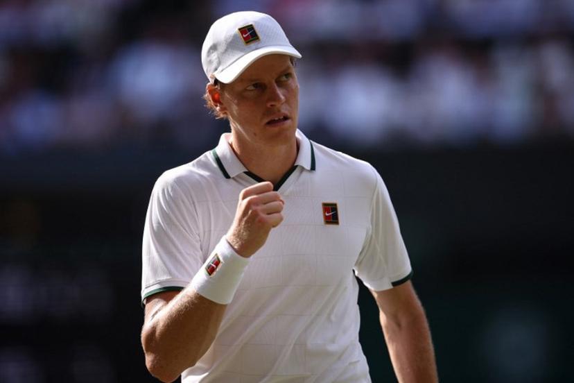 Italy's Jannik Sinner reacts against Serbia's Novak Djokovic during their men's singles semi-final tennis match on the twelfth day of the 2026 Wimbledon Championships at The All England Lawn Tennis and Croquet Club in Wimbledon, southwest London, on July 10, 2026.  HENRY NICHOLLS / AFP