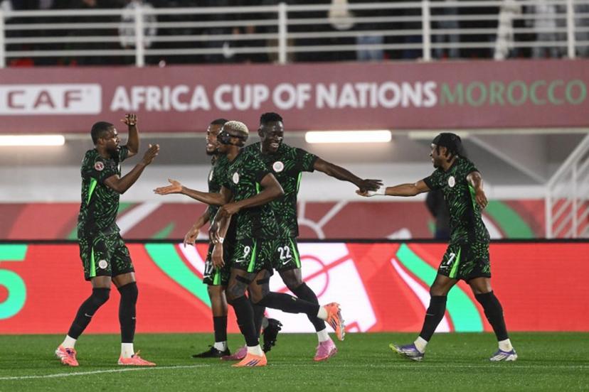Nigeria's forward #09 Victor Osimhen (3L) celebrates scoring the team's second goal during the Africa Cup of Nations (CAN) round of 16 football match between Nigeria and Mozambique at the Sports Complex stadium in Fes on January 5, 2026.   SEBASTIEN BOZON / AFP