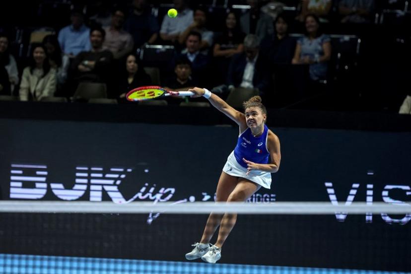 Italy's Jasmine Paolini hits a return to Ukraine's Elina Svitolina during their second singles semi-final match at the Billie Jean King Cup in Shenzhen, southern China's Guangdong province on September 19, 2025.   STR / AFP