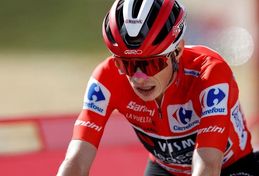 Overall leader team Visma-Lease a bike's Danish rider Jonas Vingegaard is pictured after winning the 20th stage of the Vuelta a Espana 2025, a 156 km race between Robledo de Chavela and Bola del Mundo, near Navacerrada, on September 13, 2025.    Oscar DEL POZO / AFP