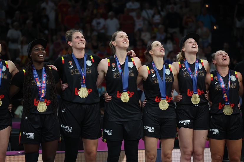 Belgium's Kyara Linskens, Belgium's Emma Meesseman, Belgium's Antonia Delaere and Belgium's Nastja Claessens celebrate after winning a basketball match between Spain and Belgian national team 'the Belgian Cats' on Sunday 29 June 2025 in Piraeus, Greece, the final of the FIBA Women's EuroBasket 2025.  BELGA PHOTO VIRGINIE LEFOUR