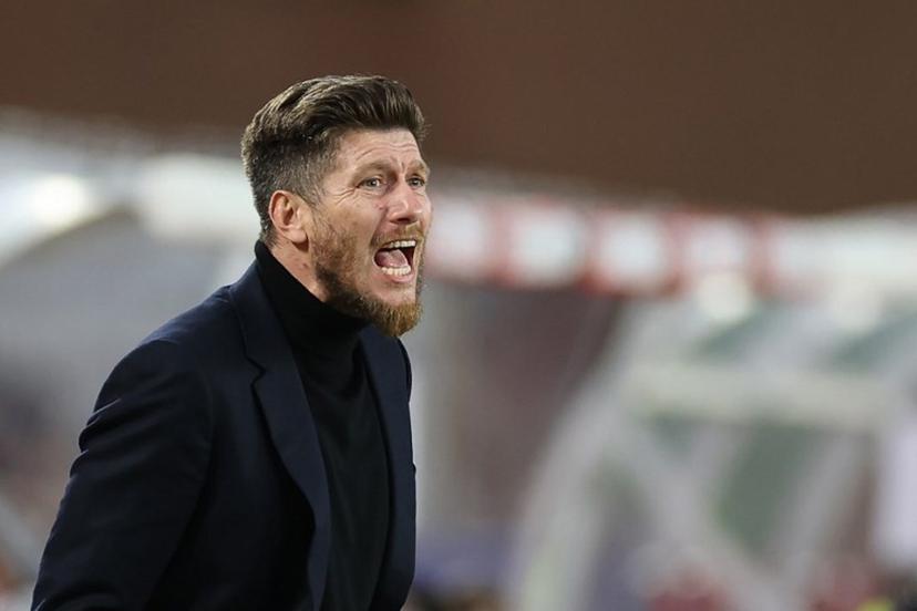 Monaco's Belgian head coach Sebastien Pocognoli gives instructions to his players during the French L1 football match between AS Monaco and Paris Saint-Germain (PSG) at the Stade Louis II in the Principality of Monaco on November 29, 2025.  Valery HACHE / AFP