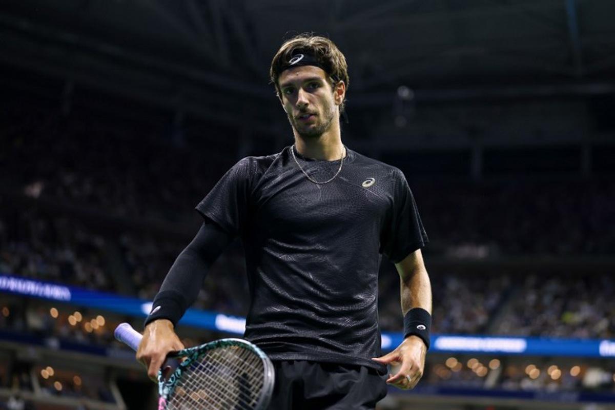 Italy's Lorenzo Musetti looks on during his men's singles quarterfinal tennis match against Italy's Jannik Sinner on day eleven of the US Open tennis tournament at the USTA Billie Jean King National Tennis Center in New York City, on September 3, 2025.  CHARLY TRIBALLEAU / AFP