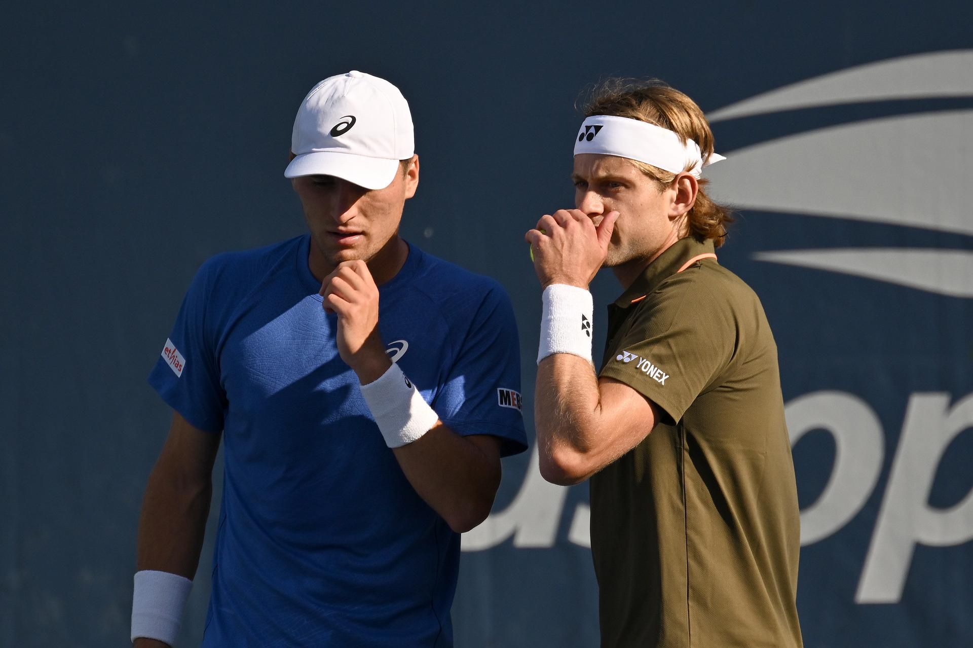 Belgian Zizou Bergs (green) and Belgian Raphael Collignon (blue) pictured during a tennis match against Australian-US pair Peers-Withrow, in the first round of the men's doubles of the 2025 US Open Grand Slam tennis tournament in New York City, USA, Friday 29 August 2025. BELGA PHOTO TONY BEHAR