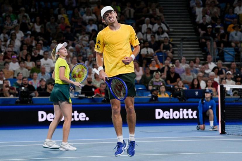 Australia's Alex de Minaur (R) and Storm Hunter react after a point against Czech Republic's Dalibor Svrcina and Miriam Skoch during their mixed doubles match at the United Cup tennis tournament on Ken Rosewall Arena in Sydney on January 6, 2026.  Izhar KHAN / AFP