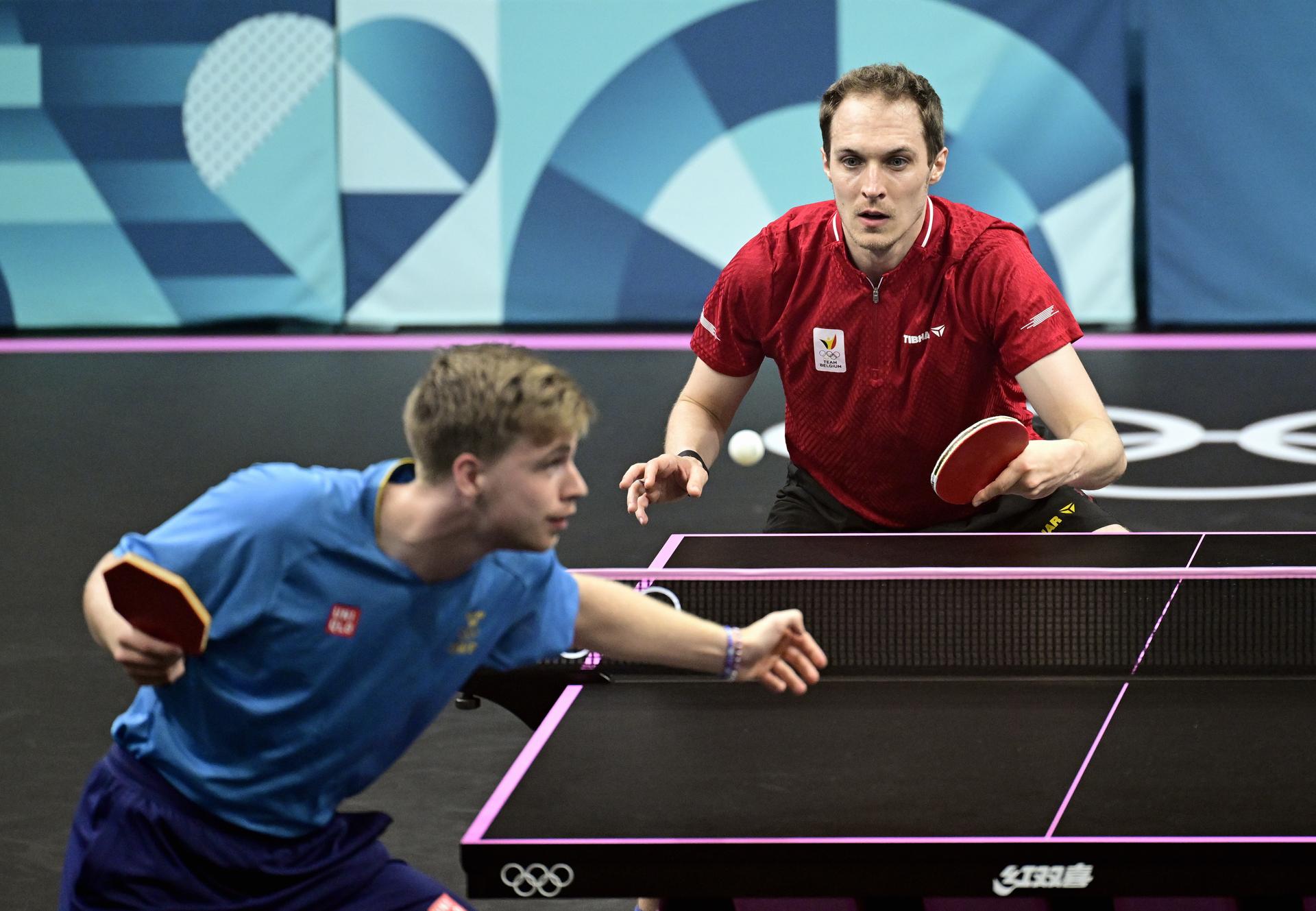 Swedish Truls Moregardh and Belgian Cedric Nuytinck contest a table tennis game in the round of 64 of the men's singles competition at the Paris 2024 Olympic Games, on Saturday 27 July 2024 in Paris, France. The Games of the XXXIII Olympiad are taking place in Paris from 26 July to 11 August. The Belgian delegation counts 165 athletes in 21 sports. BELGA PHOTO LAURIE DIEFFEMBACQ