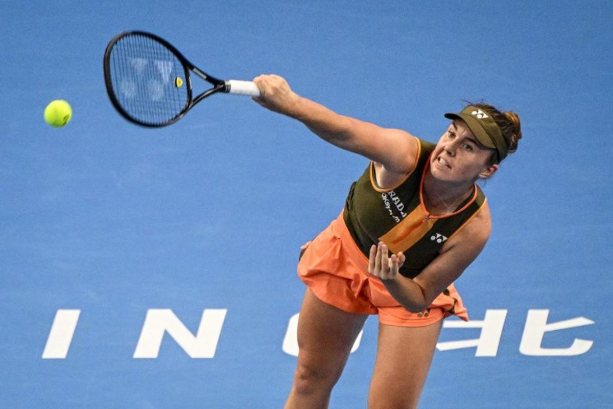 Czech Republic's Linda Noskova serves to the USA's Jessica Pegula during their women's singles semi-final match at the China Open tennis tournament in Beijing on October 4, 2025.  Greg Baker / AFP