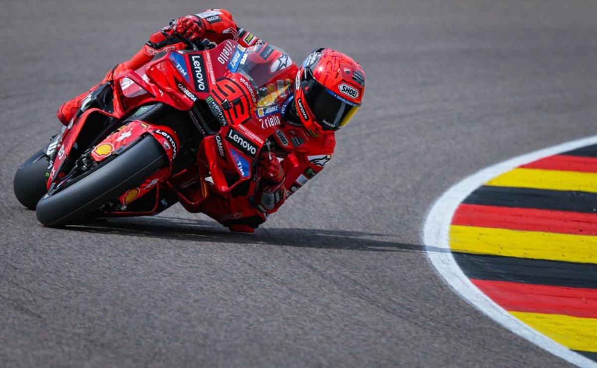 Ducati Lenovoi Team's Spanish MotoGP rider Marc Marquez steers his bike during the second practice session of the MotoGP German motorcycle Grand Prix at the Sachsenring racing circuit, in Hohenstein-Ernstthal near Chemnitz, eastern Germany on July 11, 2025.  Ronny Hartmann / AFP