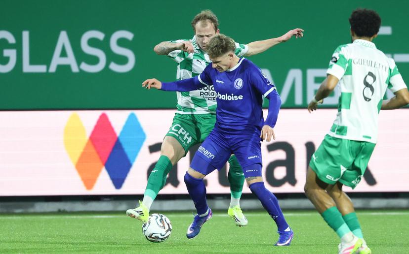 RAAL's Nolan Gillot and Gent's Michal Skoras fight for the ball during a soccer match between RAAL La Louviere and KAA Gent, Friday 30 January 2026 in La Louviere, on day 23 of the 2025-2026 'Jupiler Pro League' first division of the Belgian championship. BELGA PHOTO VIRGINIE LEFOUR
