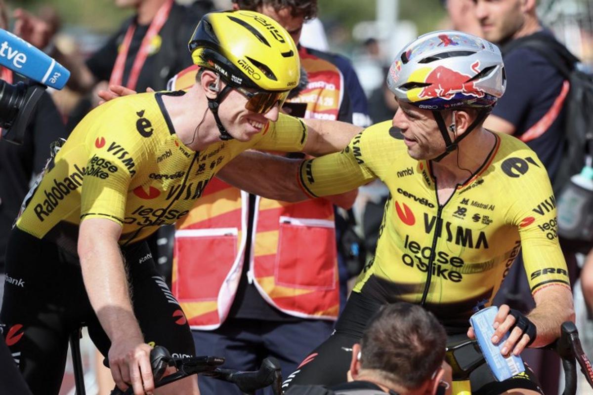 Team Visma-Lease a bike's British rider Matthew Brennan (L) is congratulated by teammate Team Visma-Lease a bike's French rider Christophe Laporte after winning the fifth stage of the Vuelta a Espana 2026, a 173,4 km race between Falset and Roquetes on August 26, 2026.    Josep LAGO / AFP