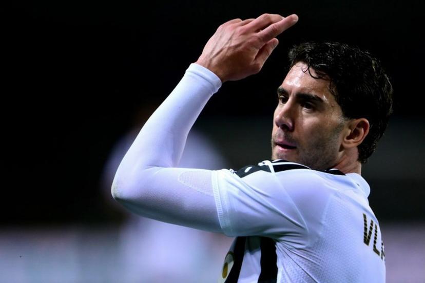 Juventus Serbian forward #09 Dusan Vlahovic celebrates after scoring a goal during the Italian Serie A football match between Torino and Juventus at the Olympic Grande Torino stadium in Turin on May 24, 2026.  MARCO BERTORELLO / AFP