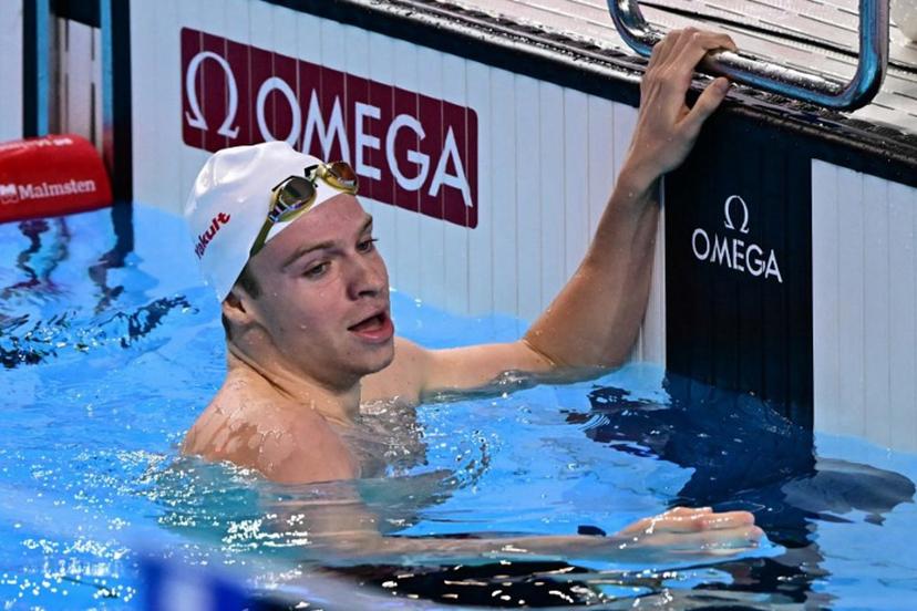 France's swimmer Leon Marchand celebrates winning the final of the men's 200m individual medley swimming event during the 2025 World Aquatics Championships in Singapore on July 31, 2025.  MANAN VATSYAYANA / AFP