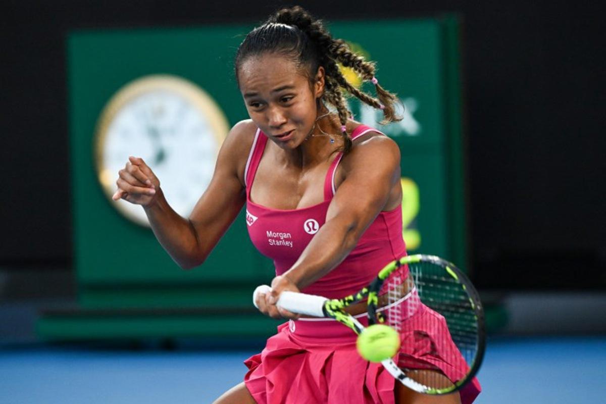 Canada's Leylah Fernandez hits a return against USA's Coco Gauff during their women's singles match on day six of the Australian Open tennis tournament in Melbourne on January 17, 2025.  Paul Crock / AFP