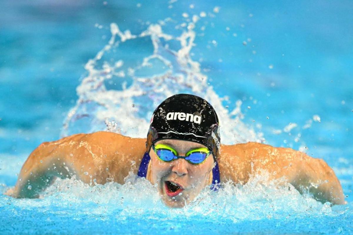 Belgium's swimmer Roos Vanotterdijk competes in  the final of the women's 100m butterfly swimming event during the 2025 World Aquatics Championships in Singapore on July 28, 2025.  François-Xavier MARIT / AFP