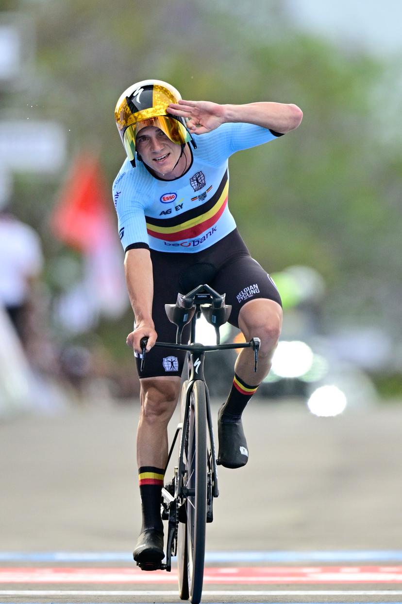 Belgian Remco Evenepoel celebrates and shows the number of his victories, three, at the arrival of the Men Elite Individual Time Trial race (40,8km) at the cycling road world championships, in Kigali, Rwanda, Sunday 21 September 2025. The 2025 UCI Road World Championships take place from 21 to 28 September in Kigali, Rwanda. BELGA PHOTO DIRK WAEM