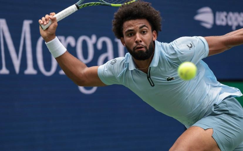 France's Arthur Fils plays a forehand return against Greece's Stefanos Tsitsipas during the men's singles first round tennis match on day two of the US Open tennis tournament at the USTA Billie Jean King National Tennis Center in New York City on August 31, 2026.  KENA BETANCUR / AFP