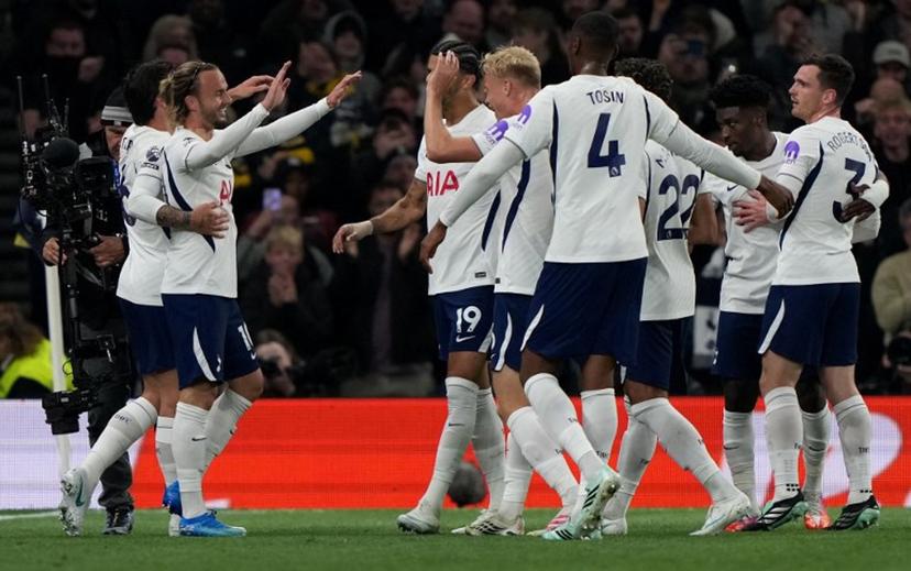 Tottenham Hotspur's English midfielder #10 James Maddison (2L) celebrates scoring the opening goal during the English Premier League football match between Tottenham Hotspur and Coventry City at the Tottenham Hotspur Stadium in London, on October 19, 2026.  Ben Stansall / AFP