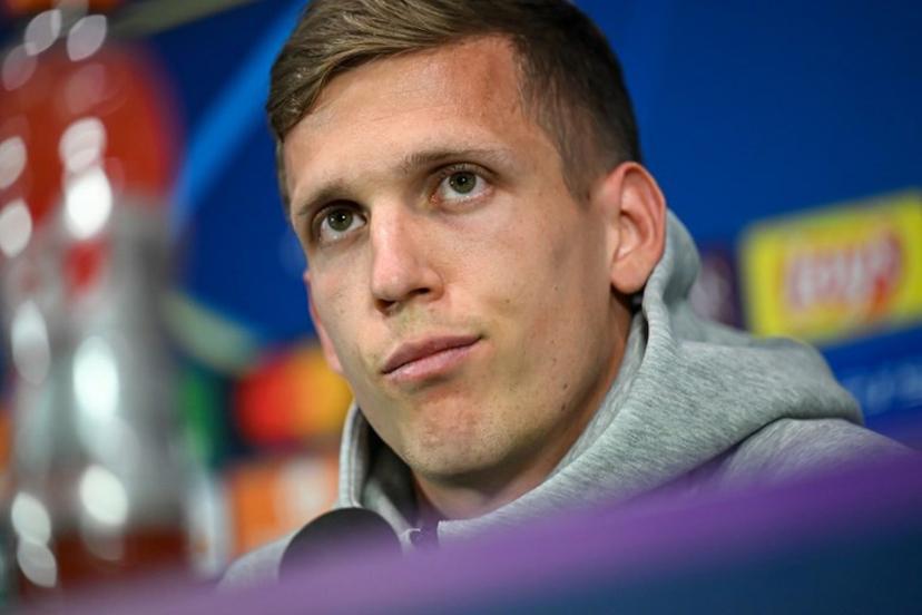 Barcelona's Spanish midfielder #20 Dani Olmo addresses a press conference, a day prior to the UEFA Champions League semi final second leg football match betweem Inter Milan and FC Barcelona, at the San Siro stadium in Milan on May 5, 2025.  Piero CRUCIATTI / AFP