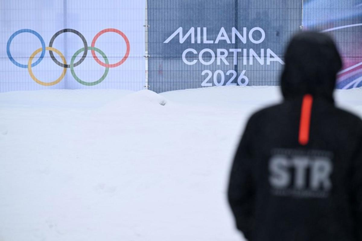 The Olympic Rings are seen on a barrier before a snowboard big air practice session ahead of the Milano Cortina 2026 Winter Olympic Games at Livigno Snow Park, in Livigno (Valtellina), on February 4, 2026.  Kirill KUDRYAVTSEV / AFP