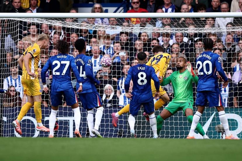 Brighton's Belgian defender #29 Maxim De Cuyper scores the team's second goal during the English Premier League football match between Chelsea and Brighton and Hove Albion at Stamford Bridge in London on September 27, 2025.  HENRY NICHOLLS / AFP