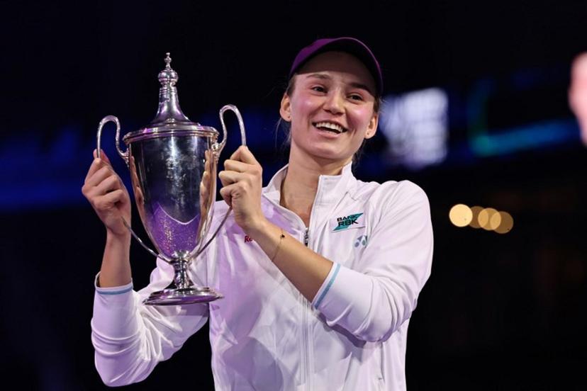 Kazakhstan's Elena Rybakina lifts the trophy after defeating Belarus' Aryna Sabalenka in the final of the Women's WTA Finals, in Riyadh on November 8, 2025. Rybakina beat world number one Aryna Sabalenka 6-3, 7-6 (7/0) to win the WTA Finals for the first time in Riyadh on November 8, to earn a record $5.235 million. Fayez NURELDINE / AFP