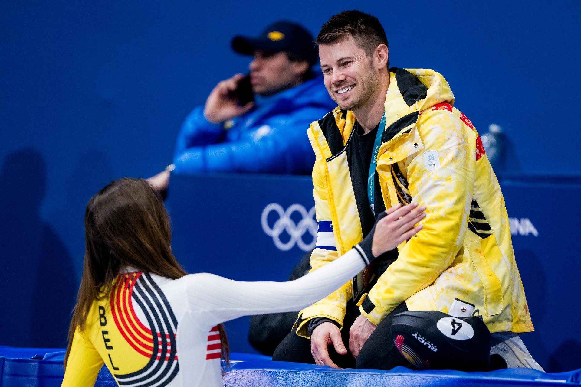 Belgian shorttrack skater Hanne Desmet and Short track coach Joey Mantia celebrate after winning the bronze medal during the finals of the Mixed Team Relay of the Short Track Speed Skating competition at the Milano Cortina 2026 Olympic Winter Games, on Tuesday 10 February 2026 in Milan, Italy. The XXV Winter Olympics take place from 6 to 22 February 2026 in Italy. BELGA PHOTO JASPER JACOBS