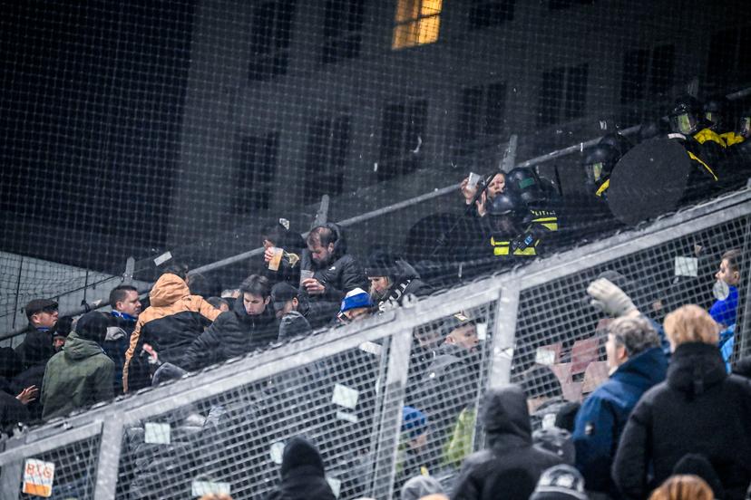 Picture shows an altercation between Dutch police and KRC Genk supporters ahead of a soccer game between Dutch soccer club FC Utrecht and Belgian KRC Genk, on Thursday 22 January 2026 in Utrecht, Netherlands, the seventh game (out of 8) in the league phase of the UEFA Europa League competition. BELGA PHOTO TOM GOYVAERTS