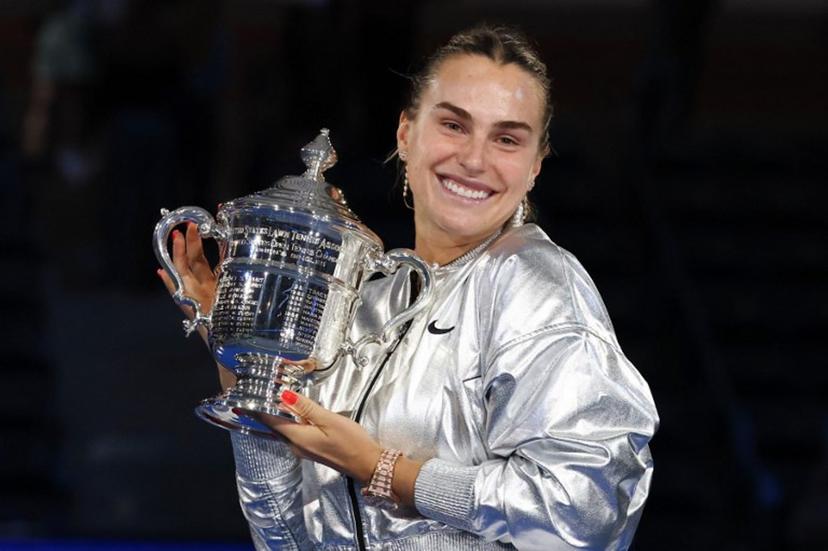 Belarus's Aryna Sabalenka poses with the trophy after defeating USA's Amanda Anisimova during their women's singles final tennis match on day fourteen of the US Open tennis tournament at the USTA Billie Jean King National Tennis Center in New York City, on September 6, 2025.  TIMOTHY A.CLARY / AFP