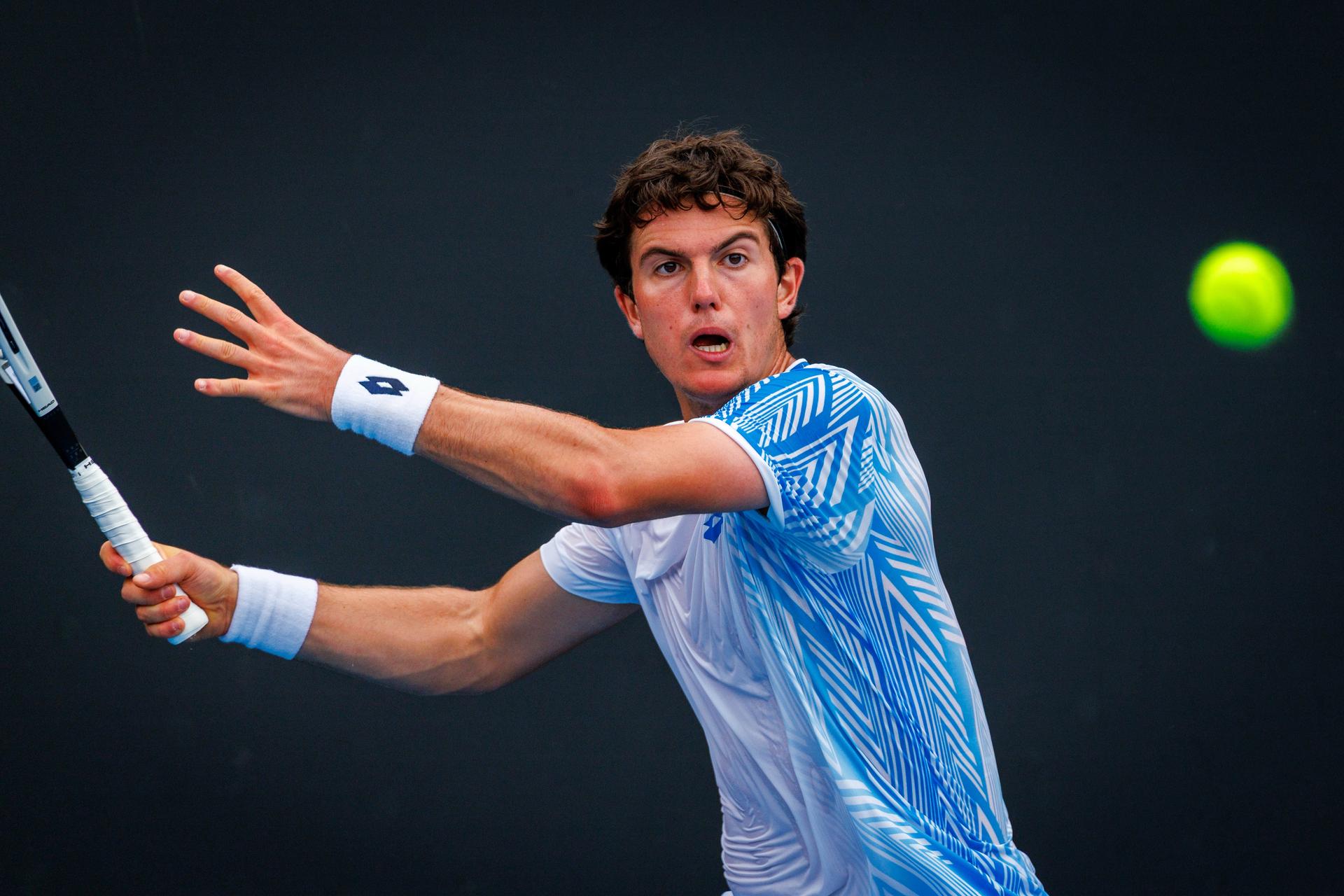 Belgium's Gilles-Arnaud Bailly pictured in action during a third round qualifying match in the men's singles against USA's Damm at the Australian Open, Melbourne Park, Melbourne on Thursday 15 January 2026.  BELGA PHOTO PATRICK HAMILTON  --- BENELUX ONLY   ---