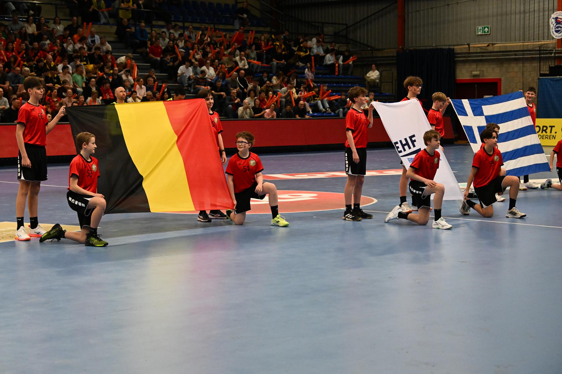 The flags pictured before a handball game between Belgian national team 'Red Wolves' and Greece, Saturday 21 March 2026 in Hasselt, fase 2 the qualifications for the men's 2027 World Championship. BELGA PHOTO JILL DELSAUX