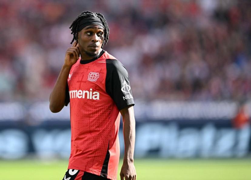 Bayer Leverkusen's Dutch defender #30 Jeremie Frimpong reacts during the German first division Bundesliga football match between Bayer Leverkusen and Union Berlin in Leverkusen, western Germany, on April 12, 2025.  INA FASSBENDER / AFP