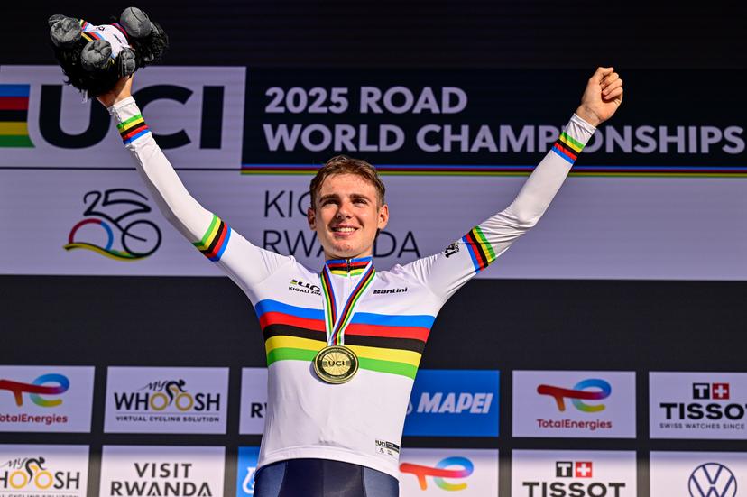Italian Lorenzo Finn celebrates on the podium after winning the u23 men road race (164,6 km) at the cycling road World Championships in Kigali, Rwanda, Friday 26 September 2025. The 2025 UCI Road World Championships take place from 21 to 28 September in Kigali, Rwanda. BELGA PHOTO DIRK WAEM