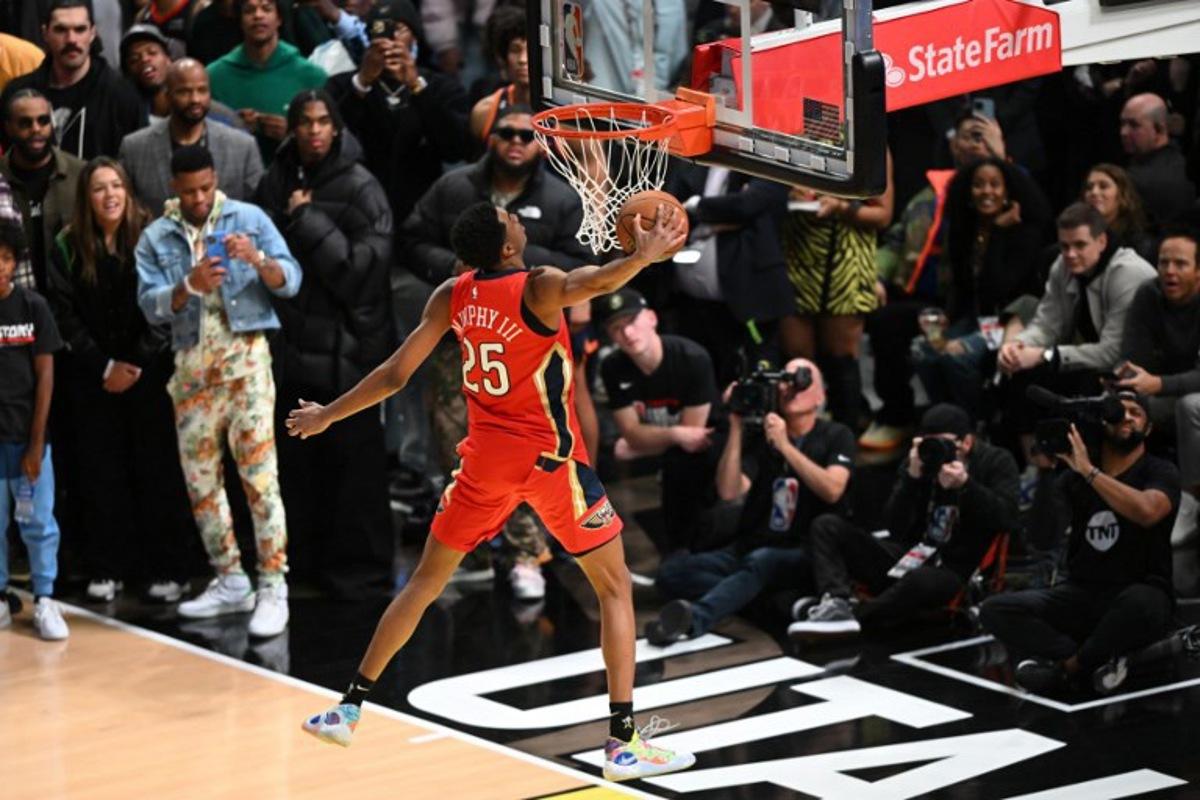 Basketball player Trey Murphy III, of the New Orleans Pelicans, competes during the Slam Dunk Contest of the NBA All-Star week-end in Salt Lake City, Utah, February 18, 2023.   Patrick T. Fallon / AFP